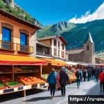 Home 21 안도라와 스페인의 관계 - A bustling Andorran street market scene showcasing vibrant stalls filled with Spanish products such ...